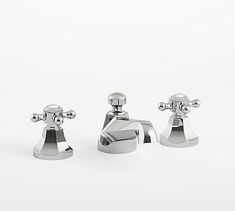 two chrome faucets on a white background