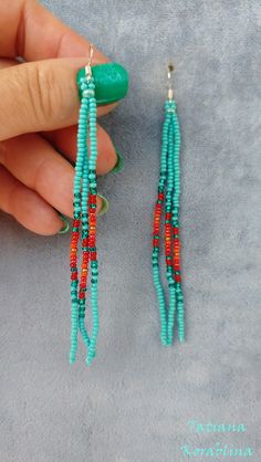 Affordable Traditional Turquoise Beaded Earrings, Handmade Turquoise Tassel Earrings For Festival, Turquoise Handmade Tassel Earrings For Festivals, Turquoise Tassel Earrings With Colorful Beads For Festival, Festival Turquoise Tassel Earrings With Colorful Beads, Turquoise Jewelry With Tassels And Round Beads, Turquoise Dangle Tassel Earrings For Festival, Turquoise Tassel Earrings With Dangling Beads, Turquoise Beaded Tassel Earrings For Gifts