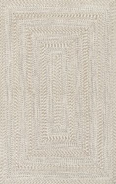 an area rug with white and beige colors