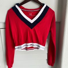 Tommy Hilfiger Cropped Hoodie. Worn Twice, Brand New Condition. Trendy Red Cotton Sweatshirt, Trendy Red Top With Ribbed Cuffs, Trendy Red Tops With Ribbed Cuffs, Red Athleisure Top For Fall, Trendy Red Long Sleeve Sweatshirt, Red Long Sleeve Athleisure Top, Tommy Hilfiger Sporty Hoodie For Fall, Red Athleisure Tops With Ribbed Cuffs, Spring Red Top With Ribbed Cuffs