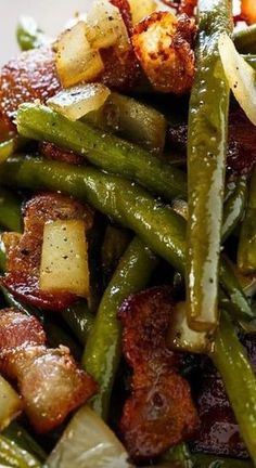 green beans, potatoes and bacon on a white plate