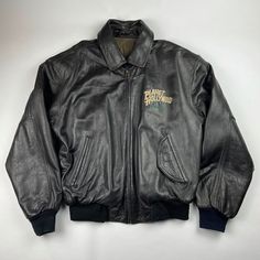 Vintage 90s Planet Hollywood Orlando Leather Bomber Jacket Black Fitted Leather Jacket With Ribbed Cuffs, Fitted Black Leather Jacket With Ribbed Cuffs, Fitted Leather Jacket With Ribbed Cuffs For Winter, Winter Black Outerwear With Contrast Cuffs, Varsity Letterman Jackets, Planet Hollywood, Aviator Jackets, Letterman Jacket, Denim Jacket Men