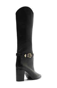 A geometric buckle accents the ankle strap on a pointy-toe leather boot shaped in a versatile knee-high silhouette. 3 1/2" heel (size 8.5) 14 1/2" shaft; 15 3/4" calf circumference Pull-on style Leather upper/leather and synthetic lining/leather sole Made in Brazil Luxury Heeled Boots With Buckle For Fall, Luxury Heeled Boots With Buckle Closure For Fall, Chic Heeled Boots With Buckle For Work, Chic Calf Leather Boots With Buckle Closure, Elegant Fall Boots With Buckle Closure, Designer Heeled Boots With Buckle For Fall, Designer Heeled Boots With Buckle Closure For Fall, Luxury Office Boots With Buckle Closure, Chic Heeled Boots With Buckle Closure For Formal Occasions