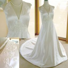 the wedding dress is on display in front of a window and next to other dresses