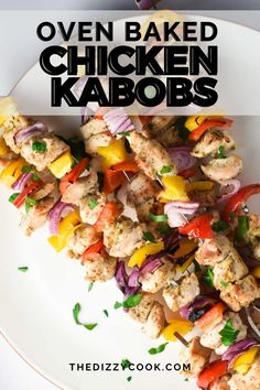 chicken kabobs on a white plate with text overlay