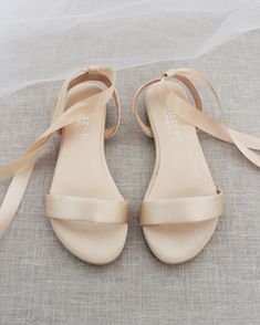 Classy satin flat sandals with ballerina lace up. Effortless yet adorable to wear on your favorite occasion. Can be pair with dress or casual look. Perfect for brides, bridesmaids, flower girls, holiday party, prom night, and any special occasions.DETAILS:UPPER: Synthetic upper and liningMATERIALS: Manmade outsoleHEEL HEIGHT: 0.4"ORIGIN: Imported Light Pink Flats, Quinceanera Shoes, Pink Dress Shoes, Flower Girl Shoes, Nude Flats, Girls Flats, Strappy Sandals Flat, Girls Heels, Wedding Flats