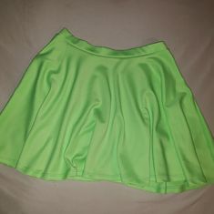 This Beautiful Skirt Can Be Worn So Many Ways. This Skirt Is Brand New Never Worn Before. Size Large Stretch Green Spring Skirt, Green Stretch Skirt For Spring, Green Stretch Flared Skirt, Trendy Green Flared Skirt Bottoms, Trendy Short Green Skirt, Short Green Lined Skirt, Spring Skirted Green Shorts, Green Stretch Mini Skirt With Lined Skirt, Spring Green Skirted Shorts