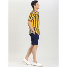 Made from lightweight fabric, this shirt is comfortable to wear and will keep you cool in the summer. The classic-fit shirt tapers throughout the body and hem for a casual look. You can pair it with pants, jeans, or shorts to complete your casual look. Add a stylish outfit option to your everyday wardrobe with this unique striped short-sleeved shirt. Casual Yellow Camp Shirt For Summer, Yellow Cotton Camp Shirt For Summer, Yellow Casual Camp Shirt For Summer, Yellow Relaxed Fit Short Sleeve Shirt For Summer, Yellow Collared Camp Shirt For Summer, Yellow Summer Shirt With Camp Collar, Yellow Cotton Hawaiian Summer Shirt, Yellow Cotton Short Sleeve Shirt For Summer, Yellow Collared Shirt For Summer