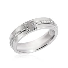 TIFFANY & Co. 18K White Gold 4.5mm Wide Diamond T Ring 5  Metal: 18K White Gold  Size: 5  Band Width: 4.5mm  Weight: 5.80 grams  Diamond: round brilliant diamonds, carat total weight .13   Hallmark: ©TIFFANY&Co. AU750 ITALY  Condition: Excellent condition, like new, comes with Tiffany box   Tiffany Price: $4,100 Authenticity Guaranteed Tiffany & Co, Tiffany And Co Rings, Rose Outfit, T Ring, Tiffany Ring, Tiffany Co Rings, Tiffany And Co Jewelry, Tiffany T, Jewelry Lookbook