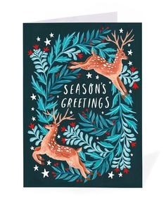 a christmas card with two deers surrounded by leaves and stars, on a black background