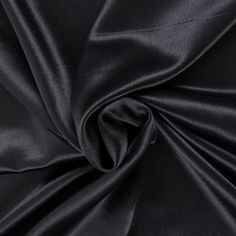 Add a satin-smooth element to your crafts with Black Crepe Back Satin Fabric. Featuring rich, shimmery black, this elegant fabric is fit for a wide range of garment creations. This satin will make your project shimmer and shine with delight!     Details:   Width: 58"  Weight: Lightweight  Country Of Origin: Japan  Content: 100% Polyester  Care: Machine Wash, Warm, Delicate Cycle; Tumble Dry, Low; Use Cool Iron; Do Not Bleach.   Flammability Note: Not For Sleepwear      Available in 1-yard increm French Maid, Fashion Lingerie, Costume Store, Tartan Fabric, Japanese Silk, Leather Baby, Print Coupons, Satin Color, Hair Color Dark