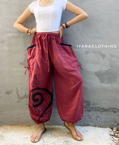 The harem style trousers made from cotton fabric 100%with an elasticated smock waist and ankles they provide a comfortable lightweight fit, perfect for casual wear, festivals, yoga, holidays as well as pairing with a plain top to get that popular look.   Materials: Cotton Sizing: One size fits most. Size : (inches) ✿Waist : 22-42 inch ( 55-106 cm ) ✿ Hip :up to 49 inch ( 124 cm) ✿ Length 39" ( 100 cm ) ✿2 sides pockets S I Z E : US SIZE 4 - 12 , UK SIZE 8 - 16 , EU SIZE 36 - 44 MODEL SIZE : size 6 (US) with 26" waist, 34" hip and 5'5" tall S H  IP P I N G   P O L  I C I E S : * We ship within 1-3 business days of cleared payment  * All orders are tracked with registered air mail S H  I P P I N G  T I M E : * USA , UK 9 - 15 working days * Europe 9-18 working days  * Australia 7-12 working Hippy Clothes, Bohemian Pants, Hippie Clothing, Festival Pants, Harem Pants Women, Style Trousers, Plain Tops, Hippie Outfits, Pants Women