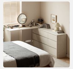 a bedroom with a bed, dresser and mirror in it's corner area next to a window