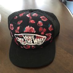 Can Off The Wall Floral Cap Adjustable Vans Cap, Vans Casual Adjustable Hats, Casual Vans Hats With Adjustable Fit, Black Snapback Trucker Hat For Spring, Black Snapback Hat For Spring, Casual Adjustable Vans Hats, Casual Black Trucker Hat For Spring, Vans Adjustable Hats With Curved Brim, Vans Hats With Adjustable Fit And Curved Brim