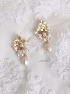 Baroque pearl bridal earrings. Details: -Gold plated findings -Freshwater pearls  -Hand wired In the case you may need your item before the indicated delivery time, or if you are seeking a possible personalisation, kindly consider to contact us, before may formalise your order. Follow us: https://instagram.com/lena_rom_/ http://www.lenarom.com/ https://www.facebook.com/LenaRomHeadpieces/ Pear-shaped White Bridal Earrings For Wedding, Baroque Pearl Charm Bridal Earrings For Wedding, Baroque Pearl Bridal Earrings With Pearl Charm, Baroque Pearl Drop Bridal Earrings, Pearl White Baroque Pearl Bridal Earrings, Wedding Bridal Earrings With Baroque Pearl Drop, Bridal Baroque Pearl Drop Earrings For Wedding, Delicate White Pear-shaped Bridal Earrings, Dangle Baroque Pearl Bridal Earrings