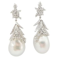 Luxury Platinum Pearl Earrings For Formal Occasions, Luxury Hallmarked Pear-shaped Diamond Earrings, Luxury Diamond Pearl Earrings For Formal Occasions, Luxury Diamond Pearl Earrings For Formal Events, Luxury Pearl Earrings With Pave Setting For Formal Occasions, Pear-shaped Diamond Earrings For Formal Events, Luxury Platinum Pearl Earrings For Wedding, Luxury Platinum Pearl Earrings, Luxury Diamond Pearl Earrings With Pave Setting