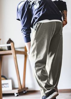 Looking for a pair of trousers that effortlessly combine comfort and style? Look no further than our Tooling Casual Chenille Smart Leggings Lazy Straight Men's Trousers. These trousers are designed to keep you looking good and feeling relaxed all day long. With their casual style and plain pattern, these trousers are perfect for any occasion. Whether you're running errands or hanging out with friends, these trousers will elevate your look without compromising on comfort. The middle waist design Baggy Khaki Pants For Loungewear, Baggy Cotton Dress Pants Straight Leg, Baggy Straight Leg Cotton Dress Pants, Loose Fit Cotton Dress Pants, Casual Tapered Leg Pull-on Dress Pants, Comfortable Relaxed Fit Khaki Bottoms, Casual Cotton Dress Pants With Relaxed Fit, Comfortable Khaki Bottoms With Relaxed Fit, Khaki Relaxed Fit Long Pants