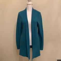 Eileen Fisher Fine Gauge Merino Wool Shawl Collar Cardigan. Petite Medium. Never Worn. Excellent Condition. Aqua Green Blue Spring Cardigan For Work, Blue Spring Work Cardigan, Spring Blue Cardigan For Layering, Blue Spring Cardigan For Layering, Elegant Blue Knit Cardigan, Blue Open Front Outerwear For Fall, Elegant Blue Sweater For Fall, Fitted Open Front Sweater For Daywear, Elegant Blue Fall Sweater