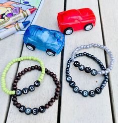 New to BaeKCreations these adorable little boy custom name bracelets. Customize with any word you would like. Perfect for birthday gifts, brother announcement, Dad gifts Product Details * Wood and Glass Beads * Acrylic Letters * Durable Elastic Cord SHOP DISCLAIMER These bracelets are made with sm 4mm beads and can be a potential choking hazard to small children. Please monitor your children at all times while they wear these bracelets so they do not put them in their mouths. This shop assumes n Bracelet Boys, Gifts Brother, Dad Bracelet, Toddler Jewelry, Toddler Bracelet, Name Bracelets, Wood Bead Bracelet, Acrylic Letters, Letter Bracelet