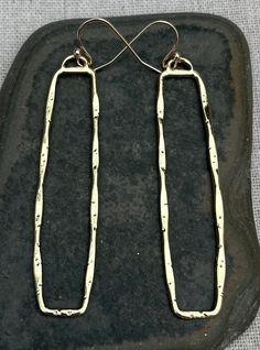 "Simple and modern long gold dangle earrings. They are versatile and lightweight. Eye catching and stylish. The perfect everyday earrings! The earrings measure 2 3/8\" long by 1/2\" wide. They hang from simple gold ear wire hooks. Overall drop length is 2 1/2\". Made from plated gold. I have this same earring style also available in silver. Here is a direct link https://www.etsy.com/listing/1480850357/ Thanks for stopping by! Please take a moment and visit the rest of my Etsy shop. I have many m Modern Gold Hypoallergenic Threader Earrings, Gold Rectangular Linear Earrings For Everyday, Metal Long Drop Linear Earrings, Single Metal Threader Earrings Long Drop, Minimalist Metal Dangle Threader Earrings, Minimalist Metal Long Drop Threader Earrings, Everyday Long Drop Metal Linear Earrings, Hypoallergenic Gold Long Drop Threader Earrings, Gold Long Drop Earrings For Everyday