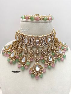 Premium quality elegant Kundan choker comes with Jhumki Earrings with attached saharey and Tikka/ Indian Jewelry/Premium Quality Polki and Kundan Jewelry/bridal necklace/pink mint/pink pista/pink sage green All items are shipped from Brampton, Ontario, Canada. If you need your item by a certain day, please reach out to us for express delivery option before placing the order so that we can update the shipping for you. Standard shipping/delivery timeline Below are the delivery timeline estimates. Luxury Pink Temple Jewelry Style Kundan Necklace, Luxury Pink Temple Jewelry Necklaces, Luxury Pink Kundan Necklace For Wedding, Luxury Multicolor Jewelry Sets For Diwali, Luxury Pink Kundan Necklace For Parties, Luxury Elegant Pink Kundan Necklace, Green And Pink Necklace, Pink Colour Dress, Desi Jewelry