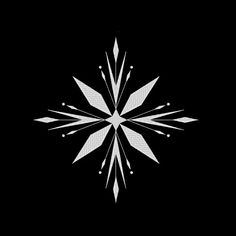 a white snowflake on a black background