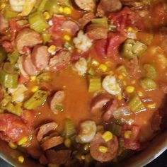 the food is prepared and ready to be cooked in the pot on the stove top