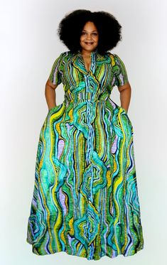 This is Ankara long dress with matching bag. Chic Maxi Dress With Pockets For Party, Chic Party Maxi Dress With Pockets, Elegant Multicolor A-line Maxi Dress, Long Green Midi Dress For Evening, Green Chiffon Maxi Dress, Green Maxi Dress For Casual Wear, Green Maxi Dress For Casual Occasions, Multicolor Short Sleeve Evening Maxi Dress, Green Dress Down Maxi Dress