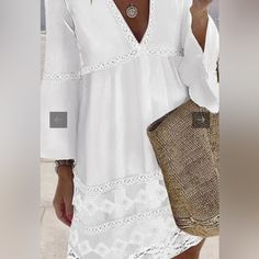 White Eyelet Lace Dress With Wide Sleeves, Giving It A Breezy Style That Is Beachy Chic . Size Small Nwt. Machine Washable 40 %Elastane 60 % Rayon Super Cute, Can Dress It Up Or Wear A Jean Jacket . Elegant Summer Holiday Mini Dress, Beach Season Mini Dress With Lace Trim, Chic Beach Mini Dress With Lace Trim, Elegant Lace Mini Dress For Beach, Chic Mini Dress With Lace Trim For Vacation, Elegant Beach Cover-up Mini Dress, Spring Mini Dress Beach Cover-up With Lace Trim, Spring Beach Cover-up Mini Dress With Lace Trim, Summer Mini Dress With Lace Trim As Beach Cover-up