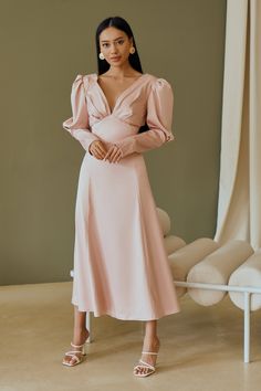 Fabric: Heavy Satin Cotton 50%, Polyester 50% V-neck dress Puffed sleeves Long sleeves Bow on back detail Zipper on back Dress lenght: 125 cm/ 49,2 inSleeve length: 68 cm/ 26,7 in Colors: White, Sky-Blue, Dusty Pink V-neck Maxi Dress With Gathered Sleeves For Brunch, V-neck Dress With Elastic Sleeves For Brunch, Feminine Lantern Sleeve Ruched Dresses, Chic Knee-length V-neck Dress With Gathered Sleeves, Chic V-neck Dress With Elastic Sleeves, Chic V-neck Long Sleeve Dress With Gathered Sleeves, Elegant V-neck Midi Dress With Elastic Sleeves, Brunch Dresses With Lantern Gathered Sleeves, Feminine Lantern Sleeve Dresses For Brunch