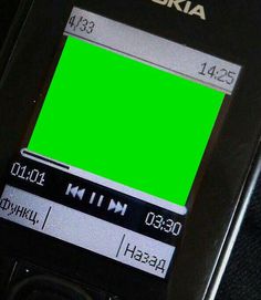 a cell phone with a green screen on it