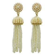 Looking for an amazing statement piece to add to your wardrobe? Bring some dynamic style to your accessory collection with these trendy handwoven earrings featuring a myriad of seed beads and stunning mother of pearl. Artistic and stylish, these beaded earrings are sure to be a conversation piece every time you wear them! Long post back dangle earrings measure 3.5 inches in length On trend design featuring tassel fringe of cream colored mini faux pearls. Pop art candy for your ears is sure to br Elegant White Beaded Earrings With Tassels, Bohemian White Pearl Earrings, Elegant White Tassel Earrings With Beaded Fringe, Bohemian White Pearl Beaded Earrings, White Pearl Beaded Bohemian Earrings, Adjustable White Beaded Pearl Earrings, Bohemian Pearl Beaded Dangle Earrings, Elegant Beaded Tassel Earrings For Summer, Cream Beaded Earrings For Party