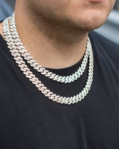 A modern essential in hip-hop fashion, the Diamond Prong Cuban links are immensely popular with today's artists. Whether you're looking to steal the spotlight, or just want to add a bit more confidence to your fit for the night, the Diamond Prong Cuban chain is the perfect accessory for any occasion. We stand by the quality and craftsmanship of our merchandise. All of our products are plated with high quality 14-18 karat gold, and if applicable, feature handset stones.  Our Diamond Prong Cuban Link Chains are 3 times PVD plated with 18K Yellow or White Gold, to ensure there's no fading, and feature handset AAA CZ stones for a superior shine. Material: Brass  Finish: 18K White Gold Stone: AAA Cubic Zirconia Silver Chain Cuban Link Necklace For Streetwear, Streetwear Cuban Link Silver Chain Necklace, Trendy Silver Chain Necklaces For Streetwear, Modern Chain Jewelry For Streetwear, Trendy Silver Chain Necklace For Streetwear, Trendy Streetwear Necklaces With Silver Chain, Modern Link Jewelry For Streetwear, Trendy Streetwear Chain Jewelry, Trendy Streetwear Jewelry Chain