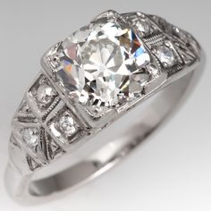 The vintage ring is centered with one (1) old European cut diamond set into a four-prong head. The shoulders feature a pierced design are each accented with three (3), bead set, round single cut diamonds, bordered with milgrain edging. The ring measures 7.2mm at the top, rises 6.0mm above the finger, tapering to 2.1mm wide and 1.6mm thick at the base of the shank. Vintage White Gia Certified Rings, Antique Gia Certified Diamond Ring For Anniversary, Gia Certified Classic Cut Diamond Ring For Anniversary, Gia Certified Classic Cut Diamond Anniversary Ring, Vintage Gia Certified White Gold Diamond Ring, Classic Gia Certified Diamond Ring, Gia Certified Antique Diamond Ring, Classic Gia Certified Cushion Cut Diamond Ring, Vintage Gia Certified Diamond White Diamond Ring