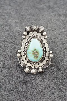 This beautiful Sonoran Gold turquoise and sterling silver ring was made by Navajo silversmith Tom Lewis. The back is signed and stamped sterling.Size: 8Length: 1 3/8"Width: 1"Free shipping on all orders! We ship with USPS and always include tracking. All orders ship within a day of payment.Returns are accepted up to 30 days after you receive your order. Just send us a message. Our shop offers cash back or store credit. The item must be returned in new condition. Tom Lewis, Instagram Jewelry, Navajo Rings, Pearl Chain, Native American Jewelry, Turquoise Sterling Silver, Turquoise Jewelry, Free Jewelry, Sterling Silver Ring