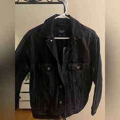 Never Worn. Black Denim Jacket. Size Is Xs, But It Is A Loose Fit. I Usually Wear Mediums For Jackets And This Fits Me (But Is Snug On My Shoulders). Black Denim Jacket With Snap Buttons For Work, Classic Black Denim Jacket With Snap Buttons, Black Denim Jacket With Snap Buttons For Winter, Black Denim Jacket With Snap Buttons For Spring, Classic Black Button-up Denim Jacket, Classic Black Denim Outerwear, Classic Black Long Sleeve Denim Jacket, Black Edgy Denim Jacket For Workwear, Black Edgy Denim Jacket For Work