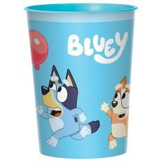 a blue cup with two dogs on it and balloons in the sky behind it that says bluey