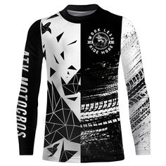 a long sleeved shirt with black and white designs