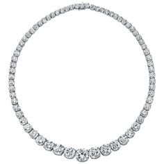 Incredible diamond graduated riviera diamond necklace crafted in hand made platnium, showcasing 68 extraordinary ideal round brilliant cut diamonds, each stone individually graded by the GIA. weighing 54.09 total carat weight, diamonds range DEFG color vvs-vs clarity. Center stone is a sparkling 3.01 carat diamond graduating to 2.51 carat diamonds on either side, continuing down to 2.17 carat and 2.13 carat etc. The craftsmanship on this necklace is just as impressive, the graduating diamonds ar Riviera Necklace, White Diamond Necklace, Rare Diamond, Necklaces Choker, The Bling Ring, Vintage Choker Necklace, Vintage Choker, Diamond Jewelry Designs, Necklace Craft