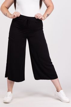 The Starting The Party Pants By Doe & Rae are a solid pair of wide leg pants. They feature a drawstring waist band, wide legs and pockets. 100% Rayon Inseam: Size M- 22'' Rise: Size M- 14'' True To Size S 0-6 M 6-10 L 10-14 XL/1XL 14-18 Relaxed Fit Wide Leg Bottoms With Drawstring, Summer Wide Leg Sweatpants With Side Pockets, Relaxed Fit Wide Leg Pants With Drawstring, Wide Leg Harem Pants With Side Pockets For Loungewear, Black Wide Leg Pants With Drawstring, Black Drawstring Wide Leg Pants For Summer, Black Drawstring Wide Leg Pants For Spring, Versatile Wide Leg Pants With Drawstring, Black Wide Leg Pants With Drawstring For Spring