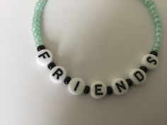 F.R.I.E.N.D.S themed mint green bracelet with black beads between the letters Bracelet With Black Beads, Mint Green Bracelet, Green Bracelet, Black Beads, Mint Green, United Kingdom, Jewelry Bracelets, Beaded Bracelets, Mint