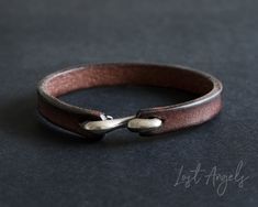 **NOTE: This item is available in TWO sizes. PLEASE ORDER THE MOST SUITABLE SIZE FOR YOUR WRIST** 100% Genuine leather brown band bracelet with a hook clasp.  Stylish design to complement both casual and smart outfits. Material: Genuine Leather. Steel Hook clasp. 20 cm OR 21.5cm Length Model wears 21.5cm. (Tip - Gents consider a 21.5cm, Ladies the 20cm) This item comes complete with a gift pouch. Leather Bracelet Tutorial, Smart Outfits, Bracelet Crochet, Stainless Steel Bracelet Men, Mens Valentines Gifts, Beaded Leather Bracelet, Mens Bracelet Silver, Minimalist Gifts, Crochet Design