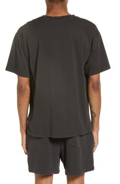 Washed with raw edges like an old favorite, this T-shirt made of cotton jersey sports a roomy, slouchy fit that looks great on its own or layered. 28" length Crewneck Short sleeves 100% cotton Machine wash, tumble dry Imported Soft-washed Relaxed Fit T-shirt For Athleisure, Black Relaxed Fit T-shirt, Washed Black Crew Neck T-shirt For Loungewear, Relaxed Fit Black Soft-washed T-shirt, Black Relaxed Fit Soft-washed T-shirt, Black Soft-washed Relaxed Fit T-shirt, Black Relaxed Fit Muscle Tee For Everyday, Sporty Washed Black Crew Neck T-shirt, Sporty Washed Black Relaxed Fit T-shirt