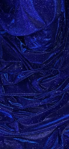 the blue fabric is very shiny and it looks like something out of space