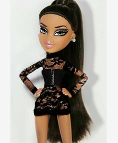 a doll with long hair wearing a black dress