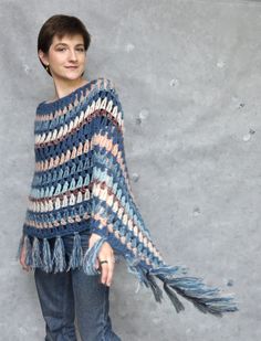 Bohemian Knitted Cape Poncho, Bohemian Yarn Poncho For Fall, Blue Bohemian Cape For Fall, Bohemian Blue Cape For Fall, Bohemian Blue Fall Cape, Bohemian Blue Cape Poncho, Bohemian Crochet Shawl Poncho, Bohemian Crochet Poncho For Winter, Bohemian Poncho In Yarn One Size