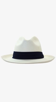 This classic Panama hat is made of Toquilla straw and features a grosgrain band. Handcrafted by skilled artisans in Ecuador. Size Guide: 56-57 cm with adjustable band. One size fits most. To find your hat size measure from the back of your head bringing the ends together at the center of your forehead right above your eyebrows. Black And White Hats, Luxury Sustainable, White Hat, Black Hat, Hats For Sale, Hat Making, Hat Sizes, Resort Wear, Your Head