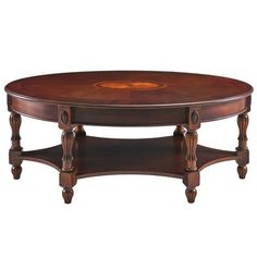 an oval coffee table with two drawers on the bottom and one drawer at the top