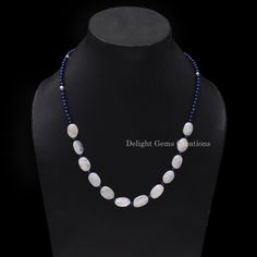 PRODUCT DETAIL : ITEM : MOONSTONE/ LAPIS LAZULI/ PEARL NECKLACE ITEM CODE :  DGC3548 ITEM NAME :NECKLACE GEMSTONE :  MOONSTONE/ LAPIS LAZULI/ PEARL BEADS SHAPE  : SMOOTH ROUND AND CHIPS LENGTH :   18 INCH APPROX BEADS SIZE:  11.5x9.5mm/3.5mm Approx. WEIGHT :  86 Cts. APPROX CUSTOMIZATION/BULK ORDER : AVAILABLE PLEASE FEEL FREE TO CONTACT IF YOU REQUIRE ANY FURTHER INFORMATION. White Jewelry With Natural Oval Stone Beads, White Oval Beaded Jewelry, White Jewelry With Natural Oval Beads, White Jewelry With Oval Natural Stones, Oval Gemstone Beaded Necklaces For Jewelry Making, Oval Gemstone Beads For Jewelry Making, White Necklaces With Oval Natural Stone Beads, White Necklaces With Oval Natural Stones, White Necklace With Oval Gemstone Beads