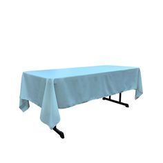 a table with a blue cloth on it is shown in front of a white background